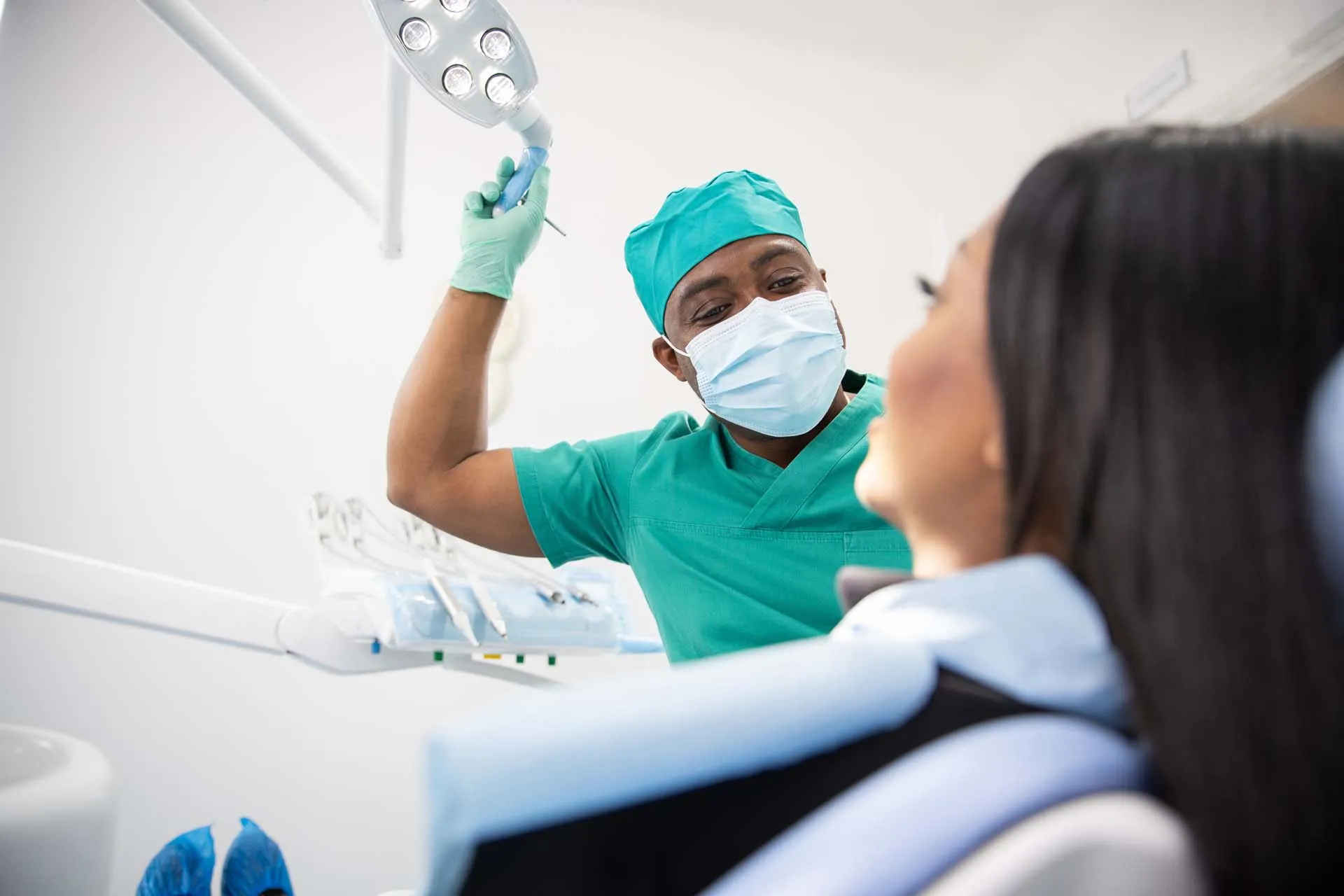 Smiling patient during a dental visit at Westphalia Dental Implant Center